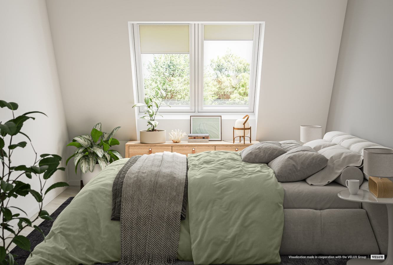 Gezellige slaapkamer met VELUX dakvenster, groen beddengoed, planten en minimalistische decoratie.