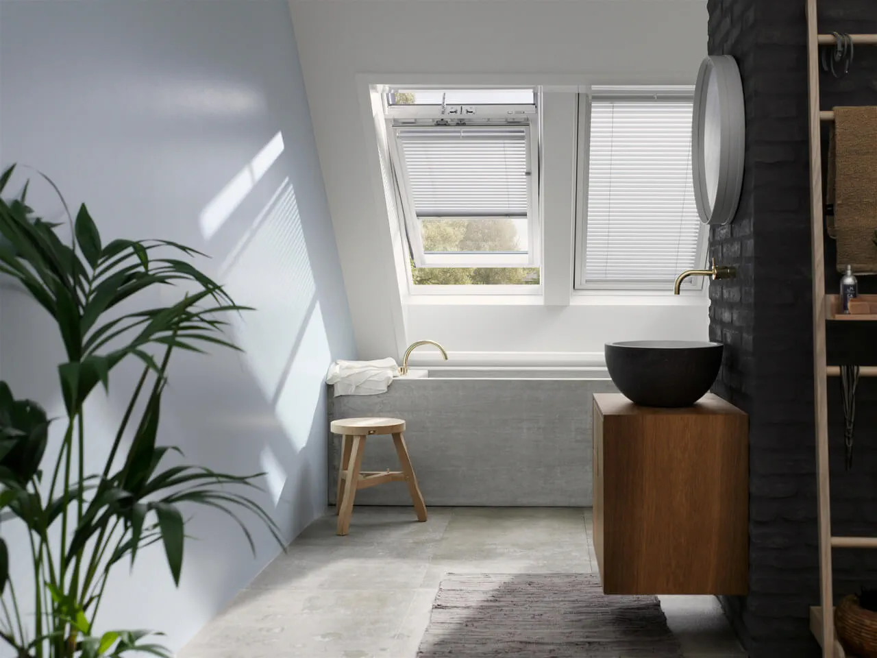 Moderne badkamer met VELUX dakvenster, ronde spiegel en houten wastafelmeubel.