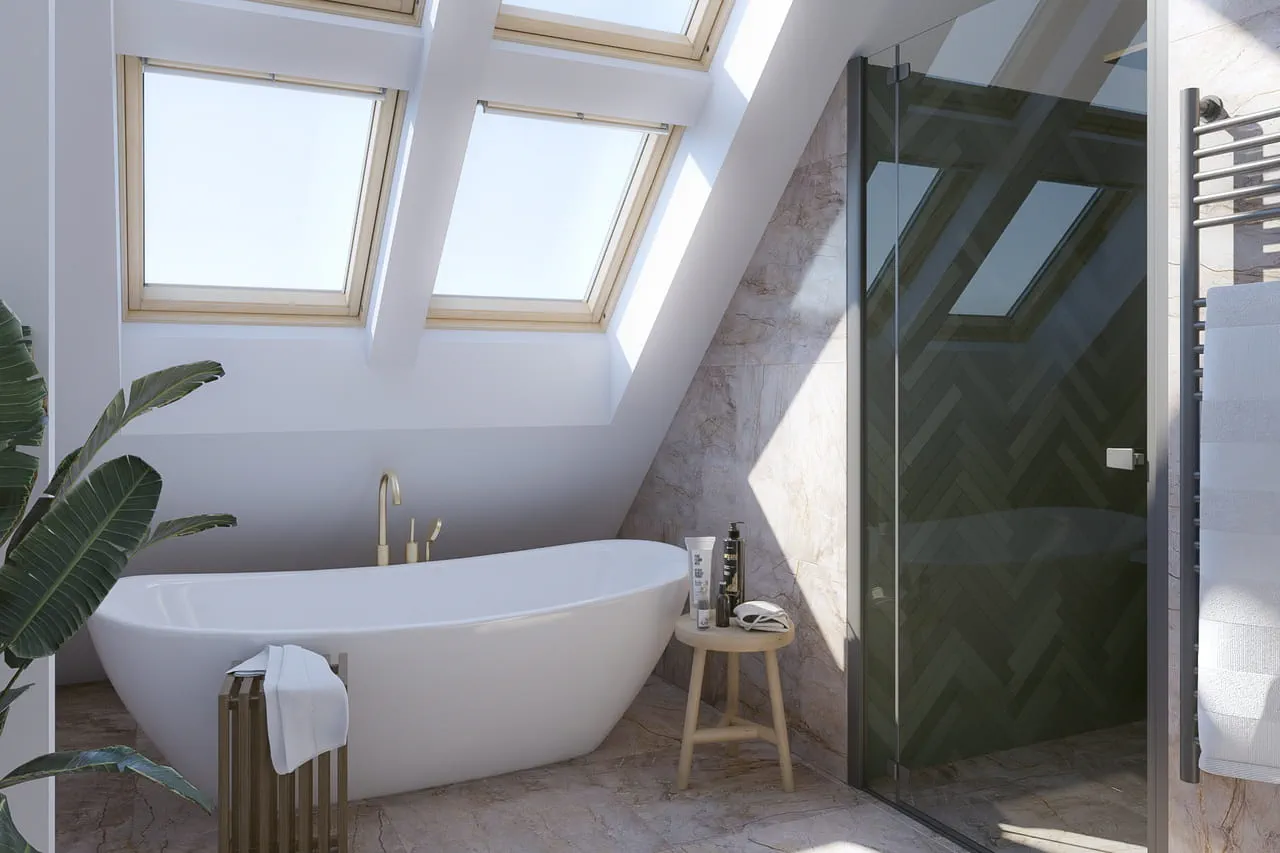 Elegant bathroom with VELUX roof windows, freestanding tub, and gold fixtures.
